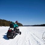 Snowmobiling on a lake
